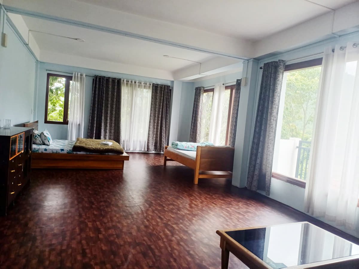 Clean, cosy guest room at Apple Tree Homestay in Shergaon