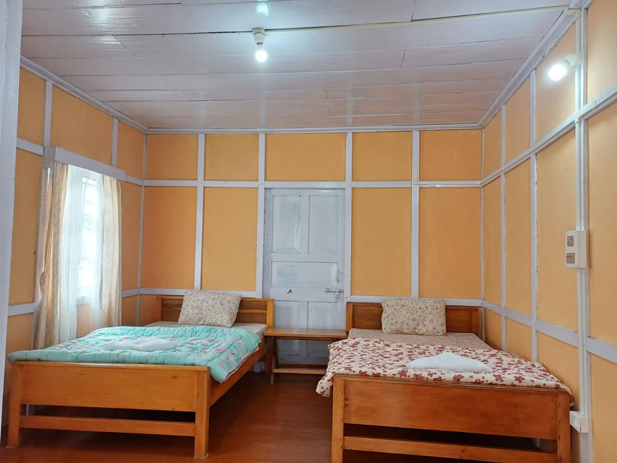 Comfortable bedroom with warm blankets at Apple Tree Homestay